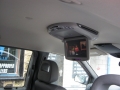 Chrysler Voyager. Roof Screen DVD Combo installed with cordless headphones