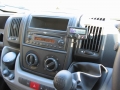 Citroen Relay Van. Parrot CK3100 handsfree phone kit fitted. "No Holes" mounting bracket manufactured to mount display in view of driver and also allowing note pad tray to still move.