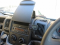 Citroen Relay Van. Parrot CK3100 handsfree phone kit fitted. "No Holes" mounting bracket manufactured to mount display in view of driver and also allowing note pad tray to still move.