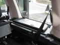 Land Rover Discovery 3. Fitted with screens trimmed into original headrest and 6 disc DVD player installed into standard location in boot area.