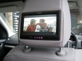 Land Rover Freelander 2. Fitted with screens trimed into original headrest. Single disc DVD installed under front seat. Cordless headphones.