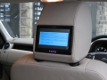 Landrover Dicovery 4. Two Screens trimmed into standard headrests. 6 Disc DVD player installed into standard location in boot. 2 cordless headphones.