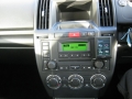 Landrover Freelander 2. Bury cc9060 voice controlled handsfree phone kit. Call audio wired through car speakers. No damage or drill holes made to car. Kit will remove without trace.