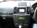Landrover Freelander 2. Garmin Nuvi Sat Nav installed as per factory look into standard location.