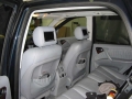 Mercedes ML. Two screens installed into standard headrest. 6 Disc DVD changer installed into boot area remotely controlled. Cordless headphones.