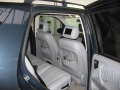 Mercedes ML. Two screens installed into standard headrest. 6 Disc DVD changer installed into boot area remotely controlled. Cordless headphones.