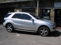 Mercedes ML. Nokia bluetooth phone kit installed with charging cradle.