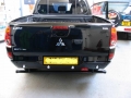 Mitsubishi L200. Rear parking sensors installed into rear panel to give that OE look.