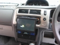 Mitsubishi Shogun Sport. In Car PC system fitted. Motorised touch screen cd tuner fitted in place of original radio. CPU fitted into boot compartment. Power supply fusebox fitted into boot for extra 12 volt supplies for other items to be fitted at later date.