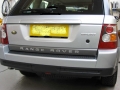 Range Rover Sport. Rear parking sensors fitted into factory locations to give the standard look.