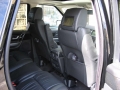 Range Rover Sport. Two Screens trimmed into headrests. Single disc DVD player installed into rear of centre console. Cordless Headphones.