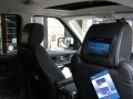 Range Rover Sport 2010. Screens trimmed into original headrests. 6 Disc DVD changer install to standard location. Cordless Headphones.