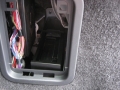 Range Rover Sport 2010. Screens trimmed into original headrests. 6 Disc DVD changer install to standard location. Slimline Sony PS3 console installed in boot. Cordless Headphones.