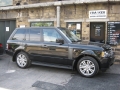 Range Rover Vouge 2010. Screens trimmed into original headrests. 6 Disc DVD changer install to standard location. Facory installed Digital TV image wired to rear headrest screens Cordless Headphones.