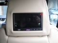 Range Rover Sport 2011. 2, 60Hz Screens trimmed into standard headrets. xBox 360 installed into boot in custom made mounting. 6 Disc DVD changer installed into standard location behind left boot trim.Factory fitted digital TV image wired into headrest screens