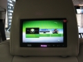 Range Rover Sport 2011. 2, 60Hz Screens trimmed into standard headrets. xBox 360 installed into boot in custom made mounting. 6 Disc DVD changer installed into standard location behind left boot trim.Factory fitted digital TV image wired into headrest screens