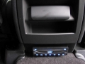 Range Rover Sport. Two Screens trimmed into headrests. Single disc DVD player installed into rear of centre console. Sony Playstation 2 installed into compartment for factory DVD Changer (not fitted) .Cordless Headphones.